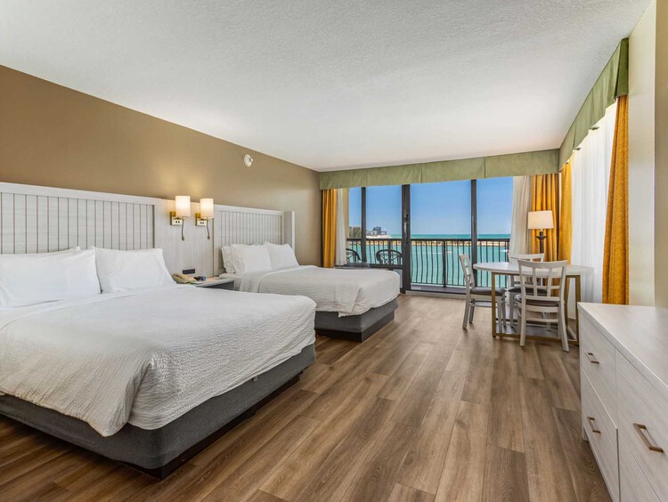 Two queen beds with a Gulf view