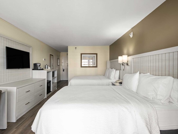 Two queen beds in a guest room