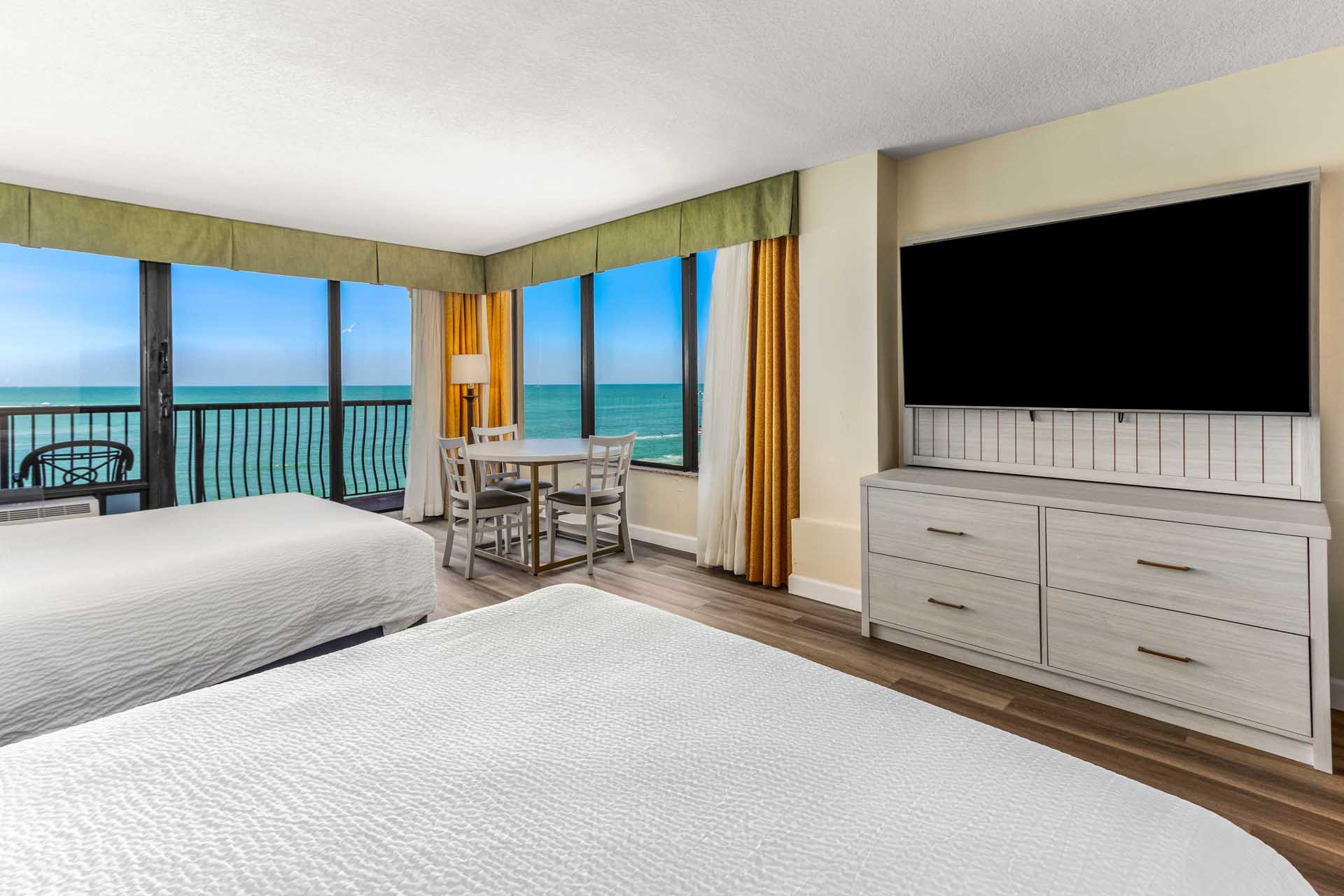 Two queen beds with a Gulf view