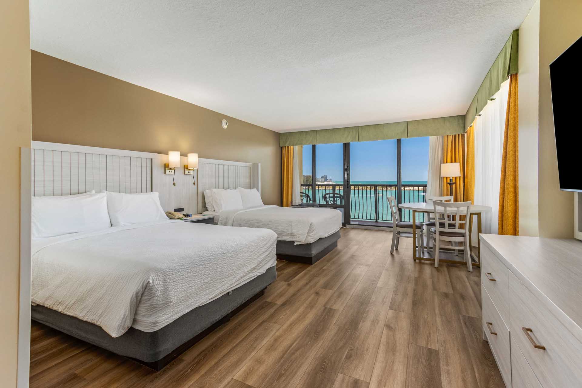 Two queen beds with a Gulf view