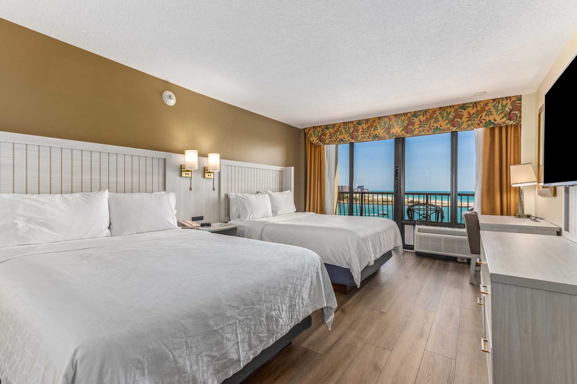Two queen beds and balcony